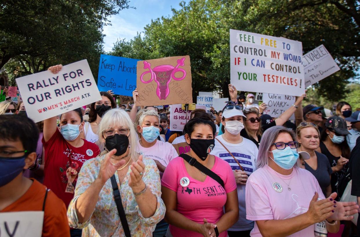 <span class="caption">Demonstrators in Austin march at the Texas State Capitol in just one of many rallies held across the U.S. to protest the state's new abortion law.</span> <span class="attribution"><a class="link " href="https://www.gettyimages.com/detail/news-photo/demonstrators-rally-against-anti-abortion-and-voter-news-photo/1235651508?adppopup=true" rel="nofollow noopener" target="_blank" data-ylk="slk:Montinique Monroe/Getty Images News via Getty Images;elm:context_link;itc:0;sec:content-canvas">Montinique Monroe/Getty Images News via Getty Images</a></span>