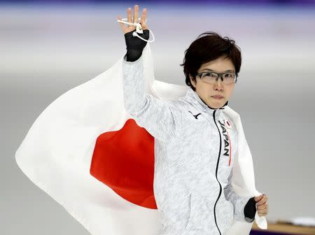 Speed Skating - Pyeongchang 2018 Winter Olympics - Women's 500m competition finals - Gangneung Oval - Gangneung, South Korea - February 18, 2018 - Nao Kodaira of Japan celebrates after winning a gold medal. REUTERS/Lucy Nicholson