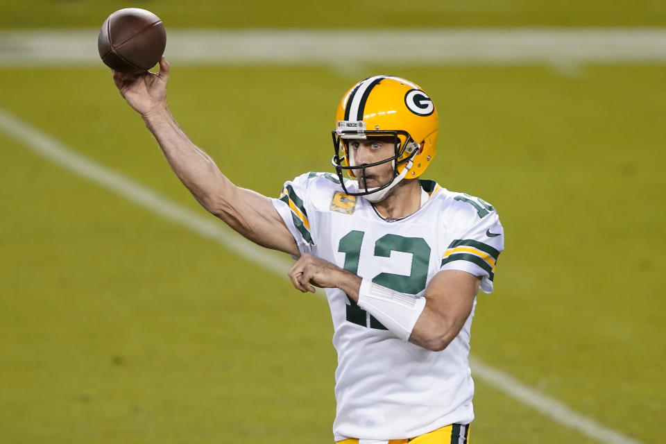 Green Bay Packers quarterback Aaron Rodgers (12) passes against the San Francisco 49ers during the first half of an NFL football game in Santa Clara, Calif., Thursday, Nov. 5, 2020. (AP Photo/Tony Avelar)