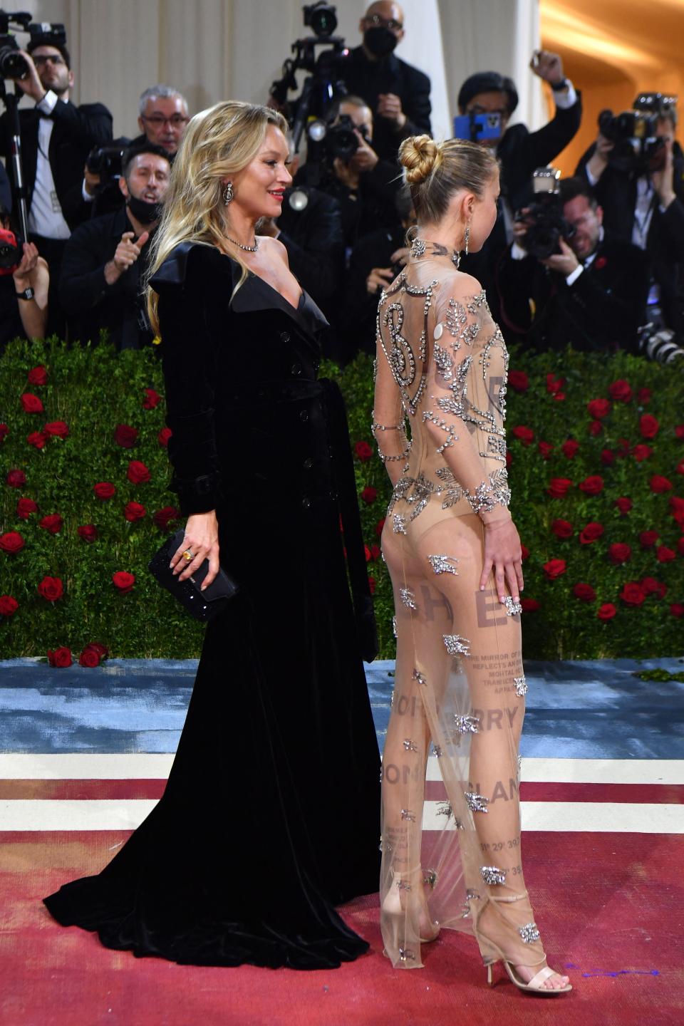 British model Kate Moss (L) and daughter, Lila Grace Moss, arrive for the 2022 Met Gala at the Metropolitan Museum of Art on May 2, 2022, in New York. - The Gala raises money for the Metropolitan Museum of Art's Costume Institute. The Gala's 2022 theme is 