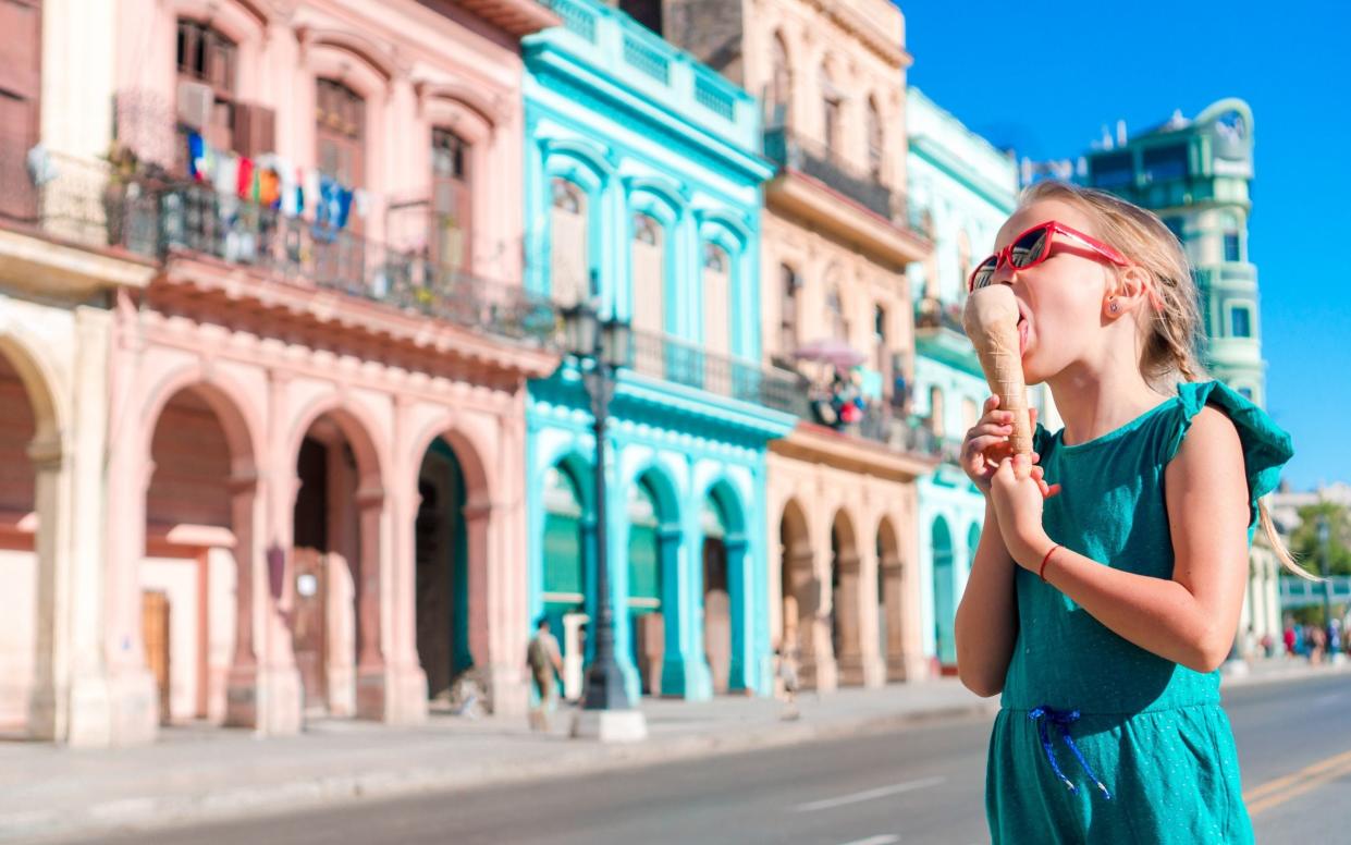 cuba little girl eating ice cream - These are the best April holidays to book now