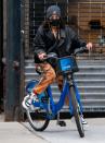 <p>Vanessa Hudgens hops on a Citi Bike on Sunday in N.Y.C., wearing a beanie, tie-dye pants and sneakers.</p>