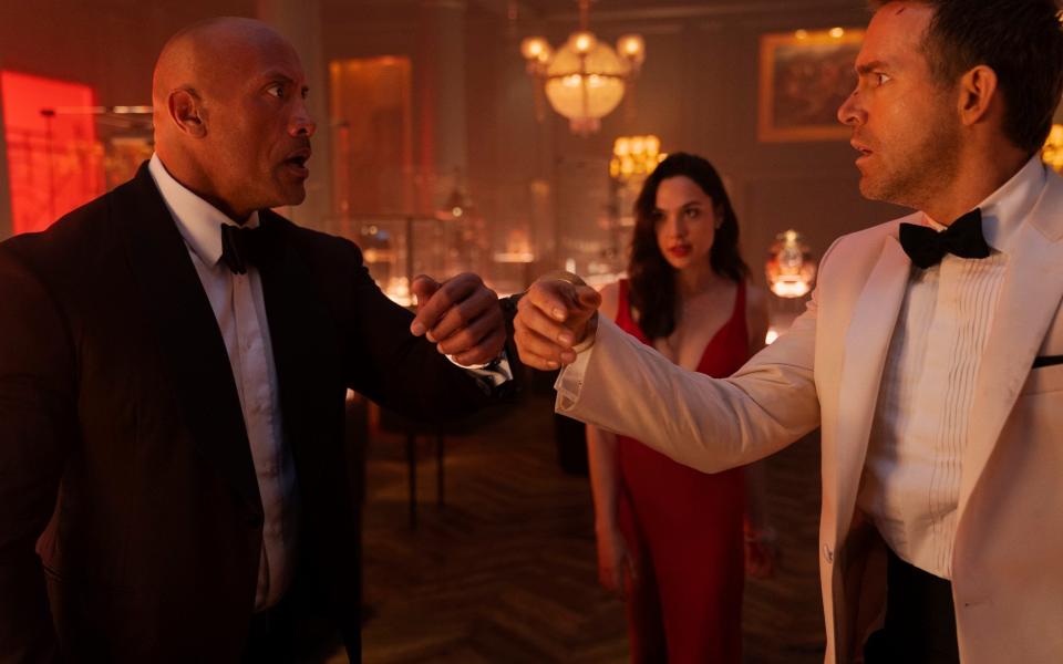 Dwayne Johnson, Gal Gadot and Ryan Reynolds in Red Notice