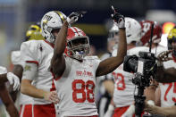 East wide receiver Ja'Marcus Bradley, of Louisiana, (88) celebrates his touchdown against the West during the first half of the East West Shrine football game Saturday, Jan. 18, 2020, in St. Petersburg, Fla. (AP Photo/Chris O'Meara)