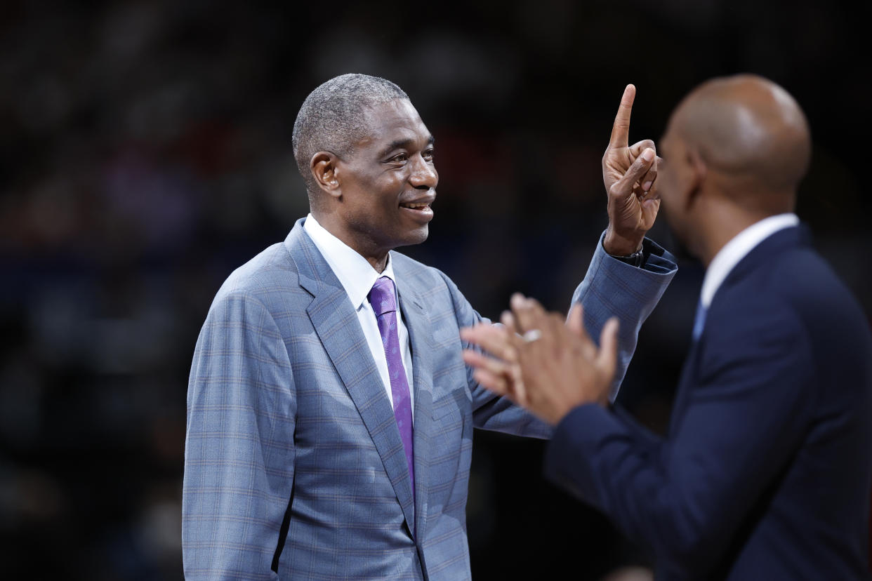 Oct 2, 2022; Saitama, JPN; Dikembe Mutombo gestures as he is introduced after the first quarter at Saitama Super Arena. Mandatory Credit: Yukihito Taguchi-USA TODAY Sports