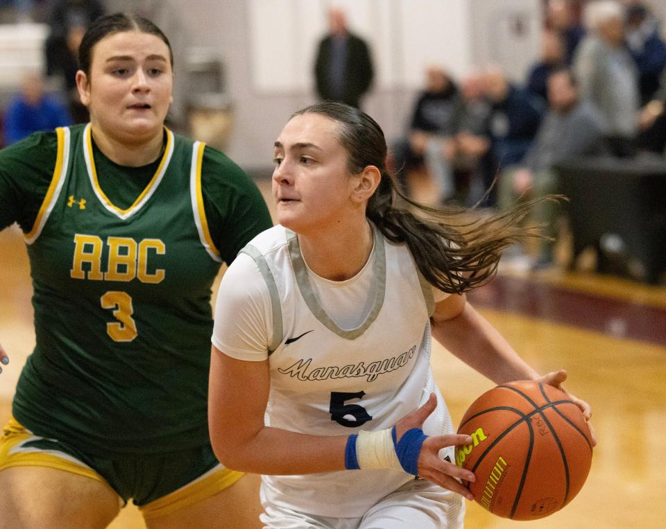Squad Katie Collins drives to the basket. Red Bank Catholic vs Manasquan in SCT Girls Basketball Semifinal on February 15, 2024 in Red Bank. NJ.