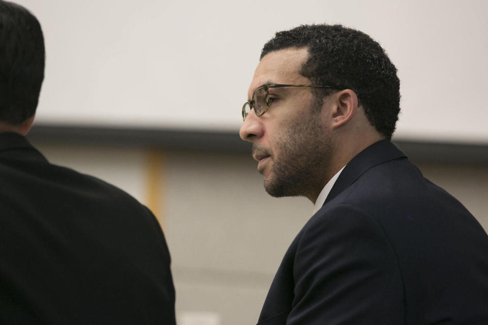 Former NFL football player Kellen Winslow Jr. looks at attorney Marc Carlos during his rape trial. (AP)