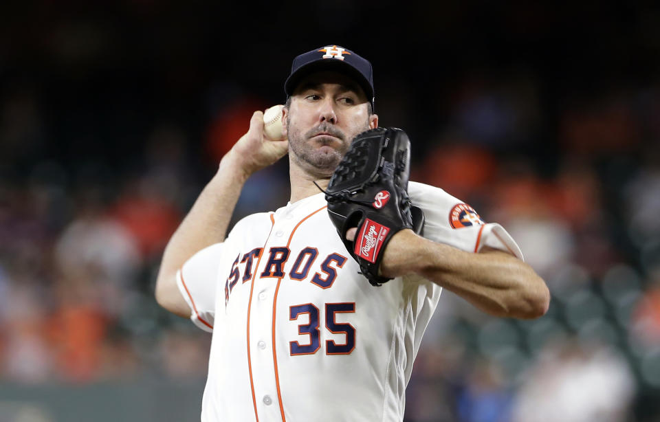 Houston Astros starting pitcher Justin Verlander (35) throws against the Tampa Bay Rays during the first inning of a baseball game Tuesday, Aug. 27, 2019, in Houston. (AP Photo/Michael Wyke)