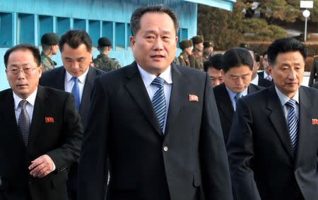 FILE PHOTO: North Korean delegation led by Ri Son Gwon, Chairman of the Committee for the Peaceful Reunification of the Country (CPRC) of DPRK, cross the concrete border to attend their meeting at the truce village of Panmunjom in the demilitarised zone separating the two Koreas, South Korea, January 9, 2018. REUTERS/Korea Pool