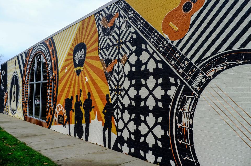 A 68 foot mural by Jennifer Springman is displayed on the wall of Elderly Instruments at 1100 N. Washington Avenue in Lansing’s Old Town.