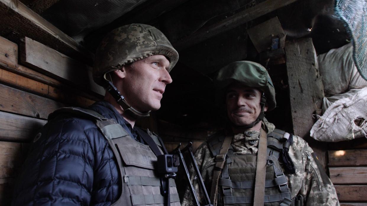 Nolan Peterson, left, on assignment in Ukraine. Peterson, a conflict journalist and Sarasota native, will give an update on the war, "Ukraine: Lessons in Modern Warfare," on Jan. 23 during the Sarasota Institute of Lifetime Learning’s “Global Issues” series.