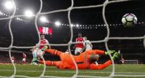 Britain Soccer Football - Arsenal v West Ham United - Premier League - Emirates Stadium - 5/4/17 Arsenal's Mesut Ozil scores their first goal Reuters / Eddie Keogh Livepic