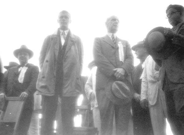 Aviator Charles Lindbergh (center) stands with Mayor John T. Alsop  (right) during a 1927 stop at the Jacksonville airfield known later as Imeson Field.