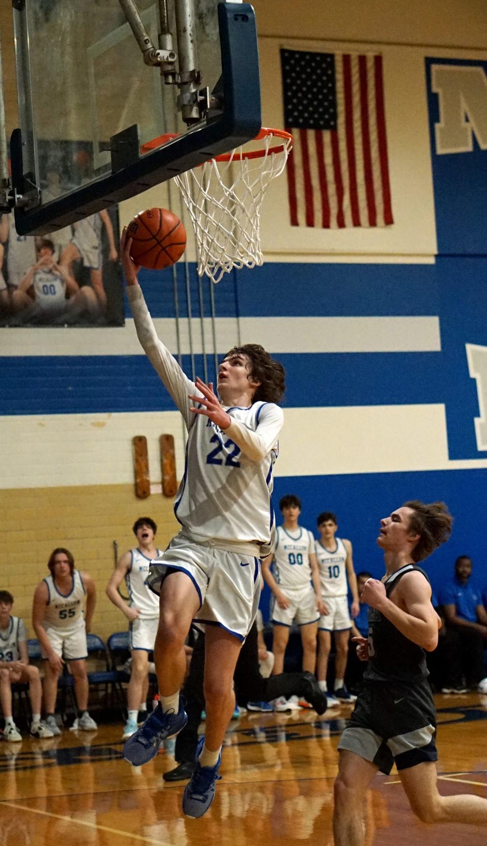 McCallum's George McCoy drives in for a layup against LASA during their Jan. 23 matchup. The Knights won this year's District 24-5A championship by going undefeated in district play. The state playoffs begin next week.