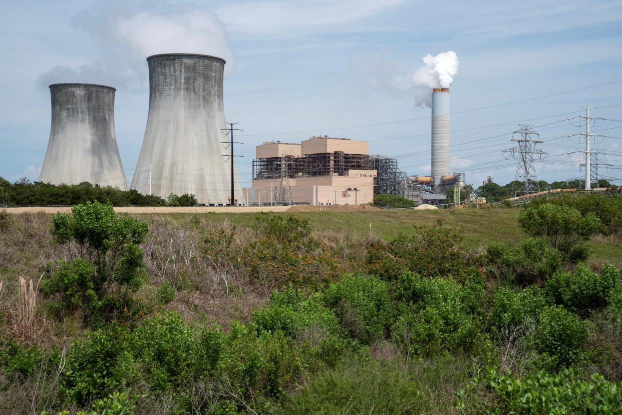 Steam rises from the cooling towers of the coal-fired power plant at Duke Energy's Crystal River Energy Complex in Crystal River, Florida, U.S., March 26, 2021. Picture taken March 26, 2021. REUTERS/Dane Rhys