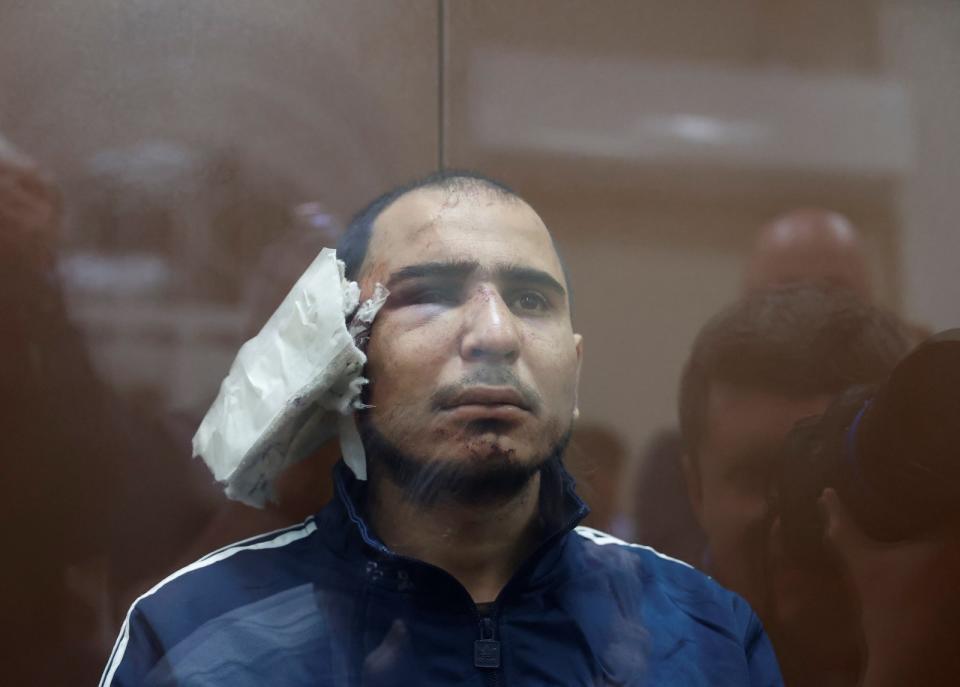 莫斯科恐攻嫌犯拉查巴利佐達24日出庭，據傳右耳已被割除。路透社
