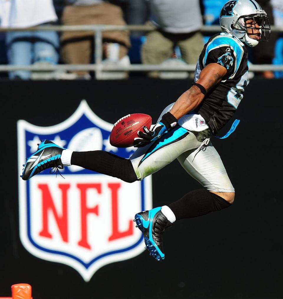 Carolina Panthers wide receiver Steve Smith leaps into the end zone for a touchdown in 2008 against Arizona.