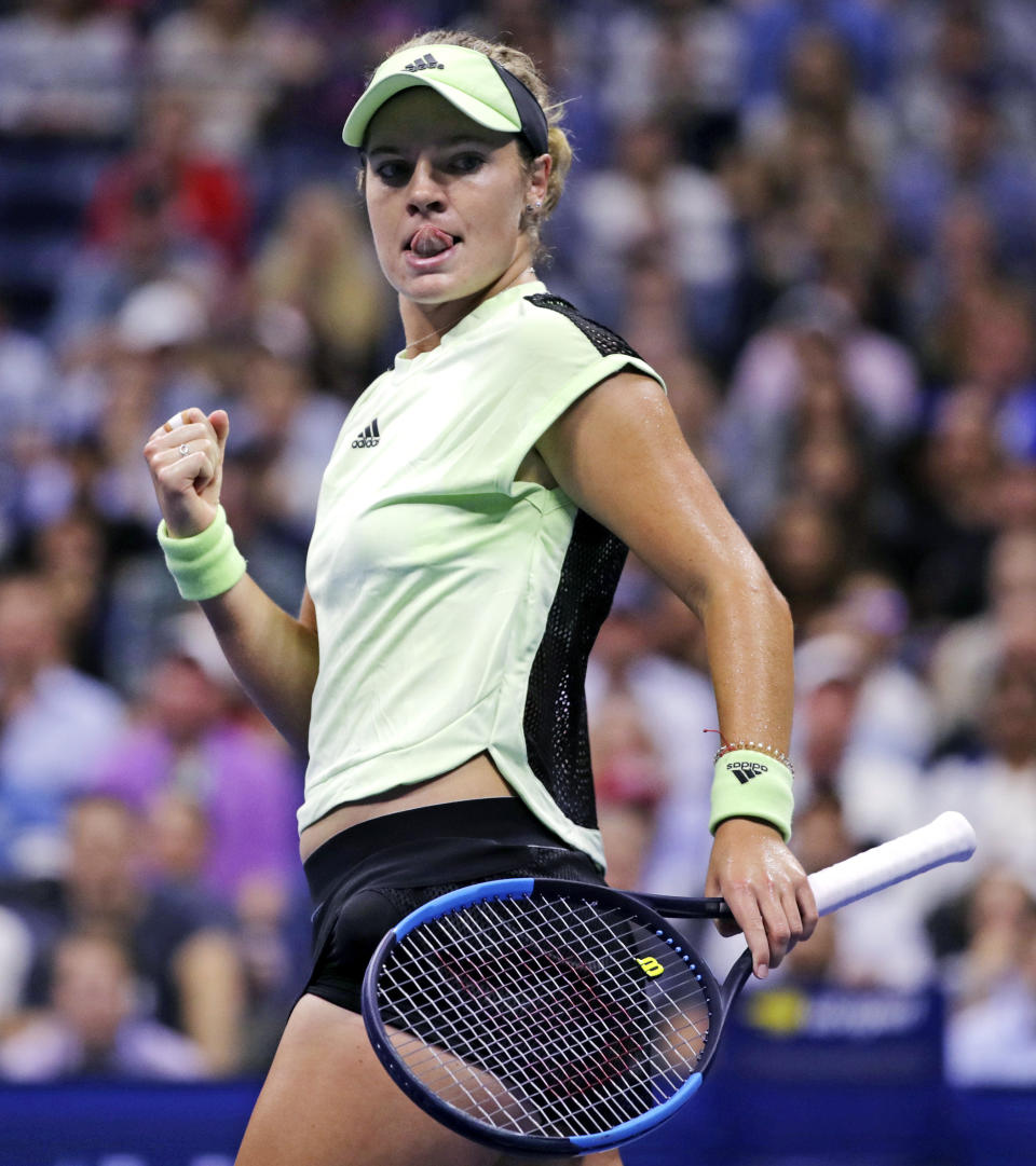 Caty McNally, of the United States, pumps her fist after winning the first set against Serena Williams, of the United States, during the second round of the U.S. Open tennis tournament in New York, Wednesday, Aug. 28, 2019. (AP Photo/Charles Krupa)