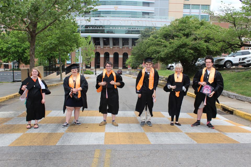 UT FUTURE students and staff take a photo together after their graduation ceremony.