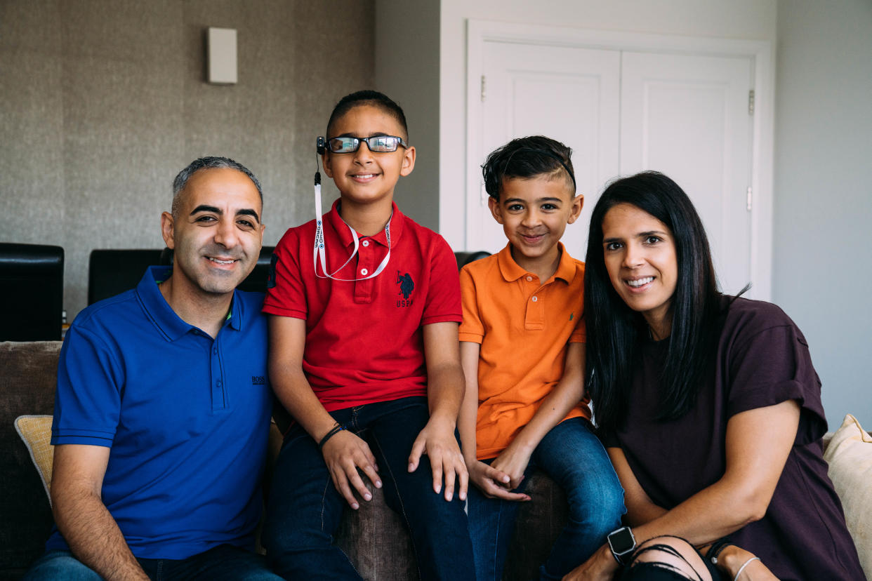 Mikey Poulli, second left, with his dad John, mum Mireille and brother Angelo