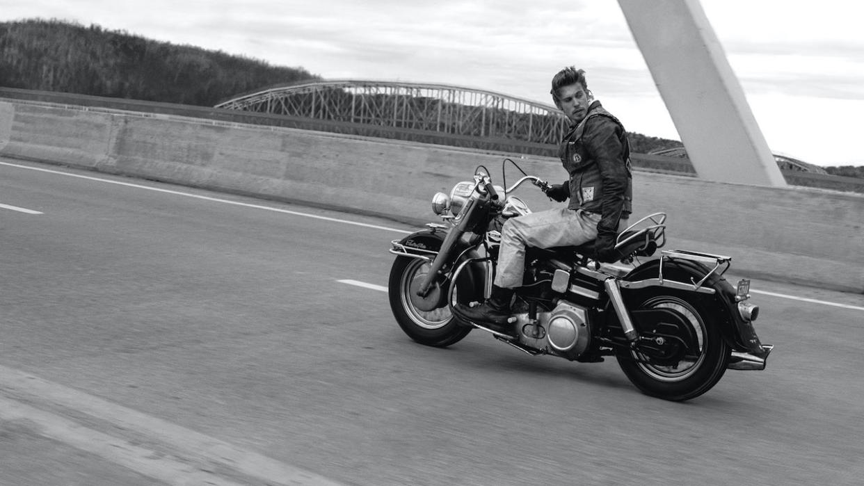  A black and white image of Austin Butler's Benny on his motorbike in The Bikeriders, one of June's new movies. 