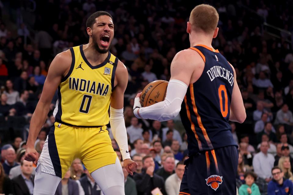 Feb 1, 2024; New York, New York, USA; Indiana Pacers guard Tyrese Haliburton (0) reacts after a dunk against New York Knicks guard Donte DiVincenzo (0) during the first quarter at Madison Square Garden. Mandatory Credit: Brad Penner-USA TODAY Sports