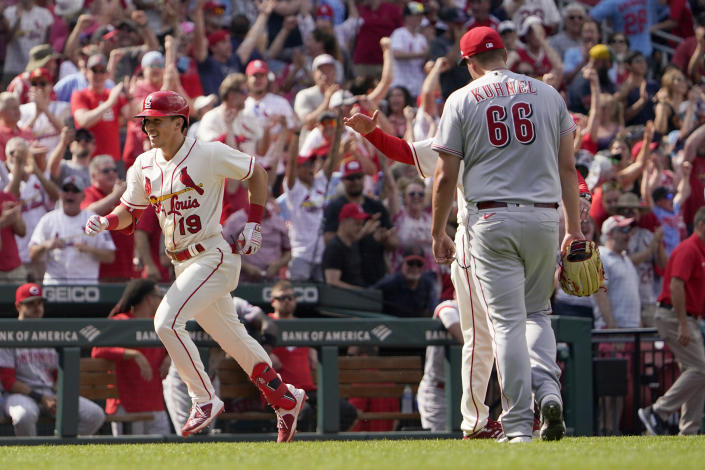 St. Louis Cardinals' Tommy Edman (19) heads home after hitting a walk-off two-run home run off Cincinnati Reds relief pitcher Joel Kuhnel (66) during the ninth inning of a baseball game Saturday, June 11, 2022, in St. Louis. The Cardinals won 5-4. (AP Photo/Jeff Roberson)