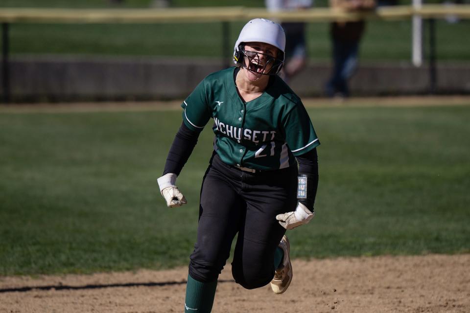 Wachusett's McKenzie Caron celebrates a two-run homer in the third inning.