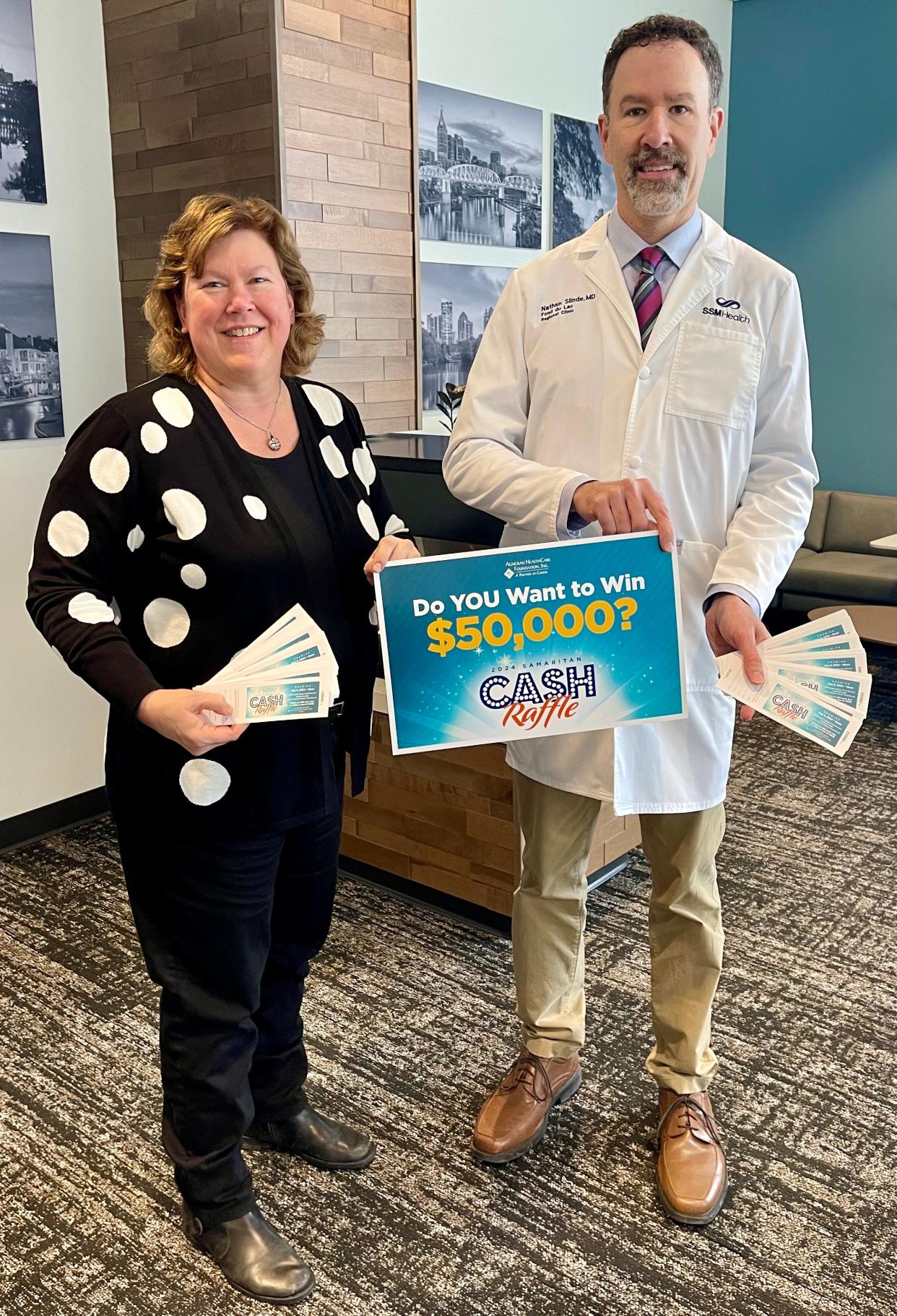 Heather Boyer, left, Society Insurance president and CEO and Dr. Nathan Slinde, an SSM Health Fond du Lac Regional Clinic gastroenterology physician are co-chairs for the 2024 Agnesian HealthCare Foundation annual Samaritan Cash Raffle.