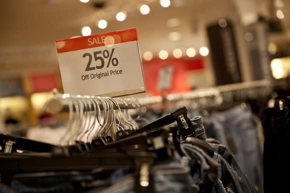 A rack of discount jeans in a department store.