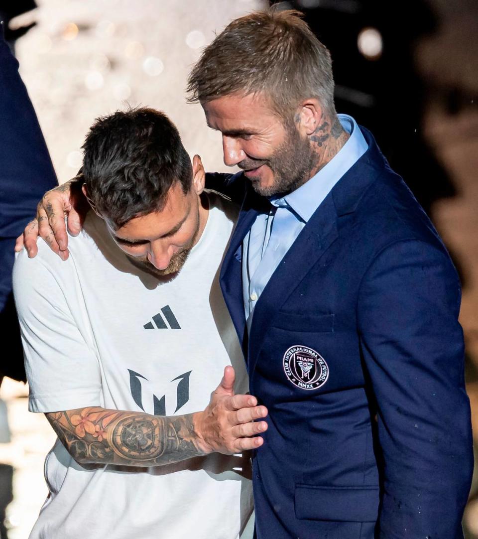 Lionel Messi and David Beckham embrace during Inter Miami’s The Unveil event at DRV PNK Stadium on Sunday, July 16, 2023, in Fort Lauderdale, Fla. The event was held to officially welcome Argentine forward Lionel Messi (10) and Spanish midfielder Sergio Busquets (5) to the team. MATIAS J. OCNER/mocner@miamiherald.com