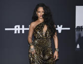 FILE - Singer and fashion designer Rihanna attends the "Rihanna" book launch event in New York on Oct. 11, 2019. Dozens of artists have objected to President Donald Trump using their music in his presidential campaigns. Rihanna demanded that Trump stop playing “Don't Stop the Music” after the song played at a 2018 rally. (Photo by Evan Agostini/Invision/AP, File)