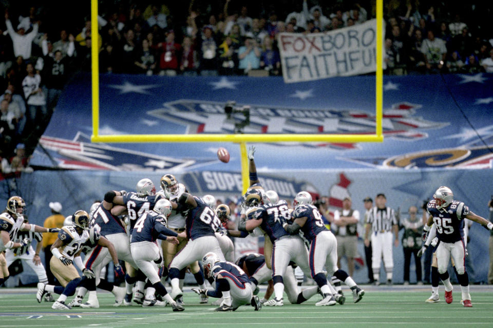 Adam Vinatieri’s 48-yard field goal as time expired in Super Bowl XXXVI propelled the Patriots to a 20-17 upset victory over the St. Louis Rams. (Getty)