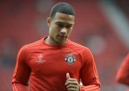 Manchester United's midfielder Memphis Depay before the start of the UEFA Champions League play off between Manchester United and Club Brugge at Old Trafford on August 18, 2015