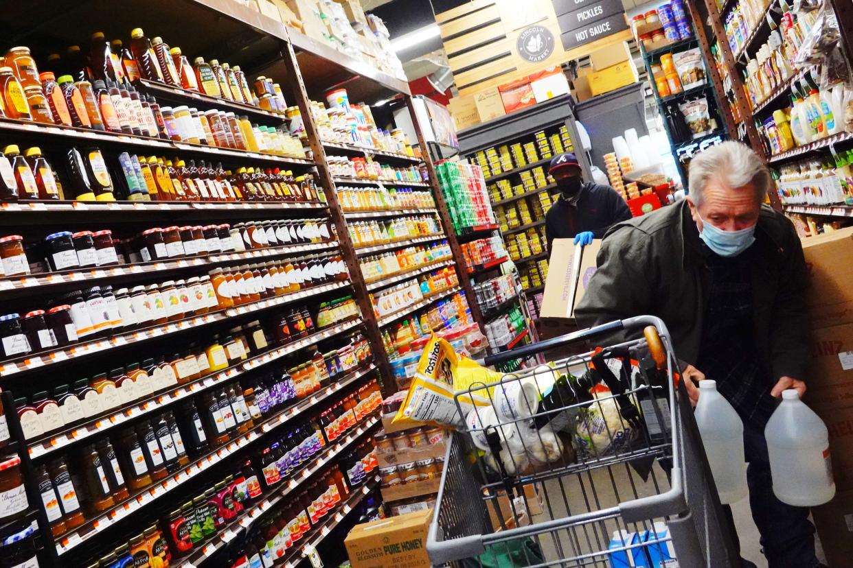 A person shops for groceries at Lincoln Market in the Prospect Lefferts Garden neighborhood of Brooklyn. 