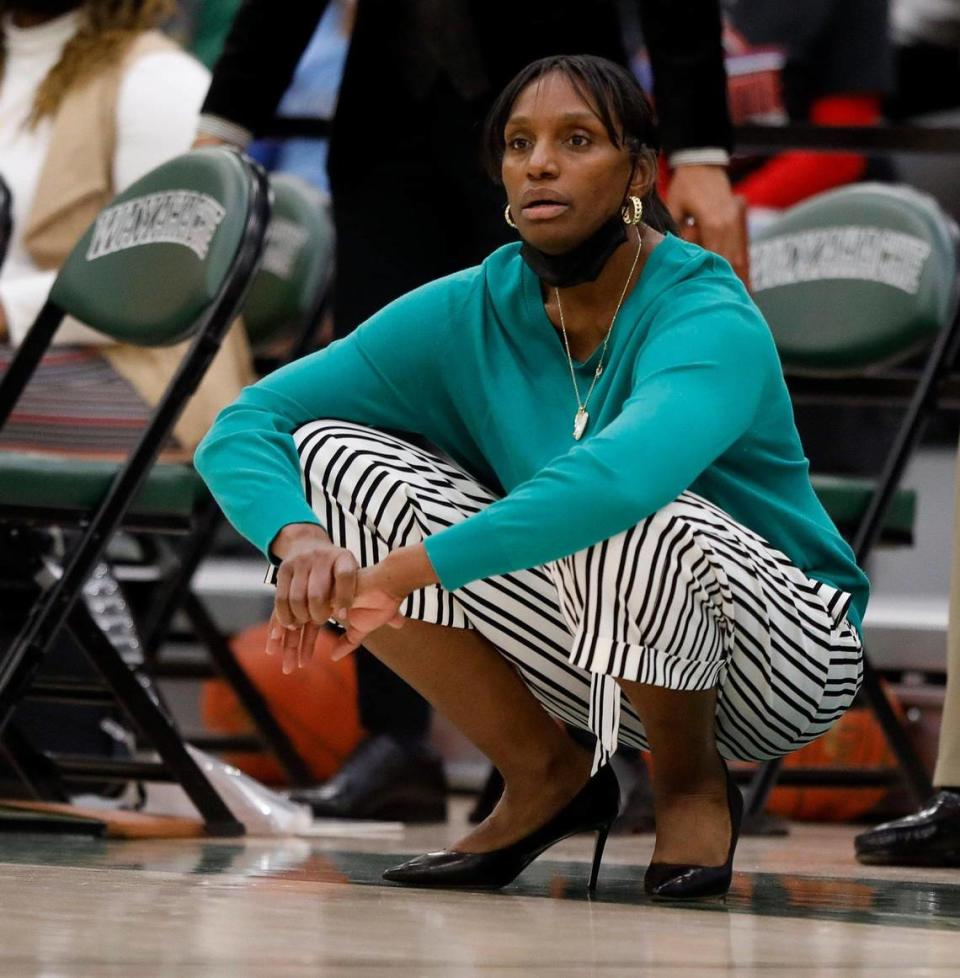 DeSoto head coach Andrea Robinson watches second half action of a 6A Region II Regional Final basketball game at Waxahachie High School in Waxahachie, Texas, Tuesday, March 02, 2021. DeSoto defeated Duncanville . 52-39. (Special to the Star-Telegram Bob Booth)