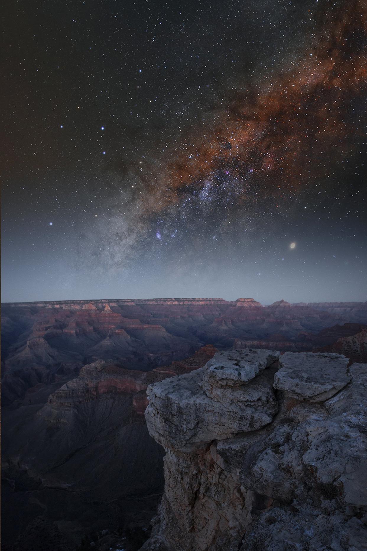 Grand Canyon at night under the light of the stars in the sky