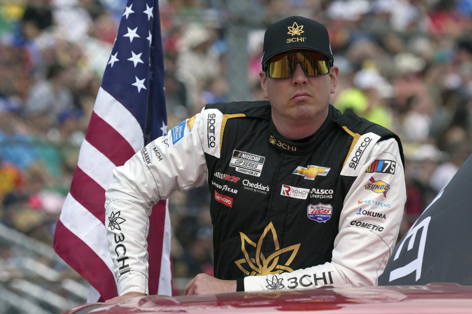 FILE - Kyle Busch during driver introductions before the NASCAR Daytona 500 auto race at Daytona International Speedway, Sunday, Feb. 19, 2023, in Daytona Beach, Fla. Kyle Busch is 0 for 18 in the 500, a skid that’s more of a headscratcher than a heartbreaker considering the two-time series champ has won at just about every track on the circuit. (AP Photo/John Raoux, File)