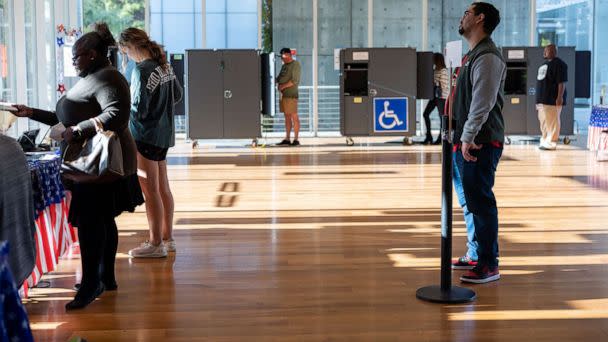 PHOTO: Georgians get ready to vote at early voting locations in Fulton County, Ga., on Oct. 22, 2022, for the November midterm elections. (Nathan Posner/Shutterstock)