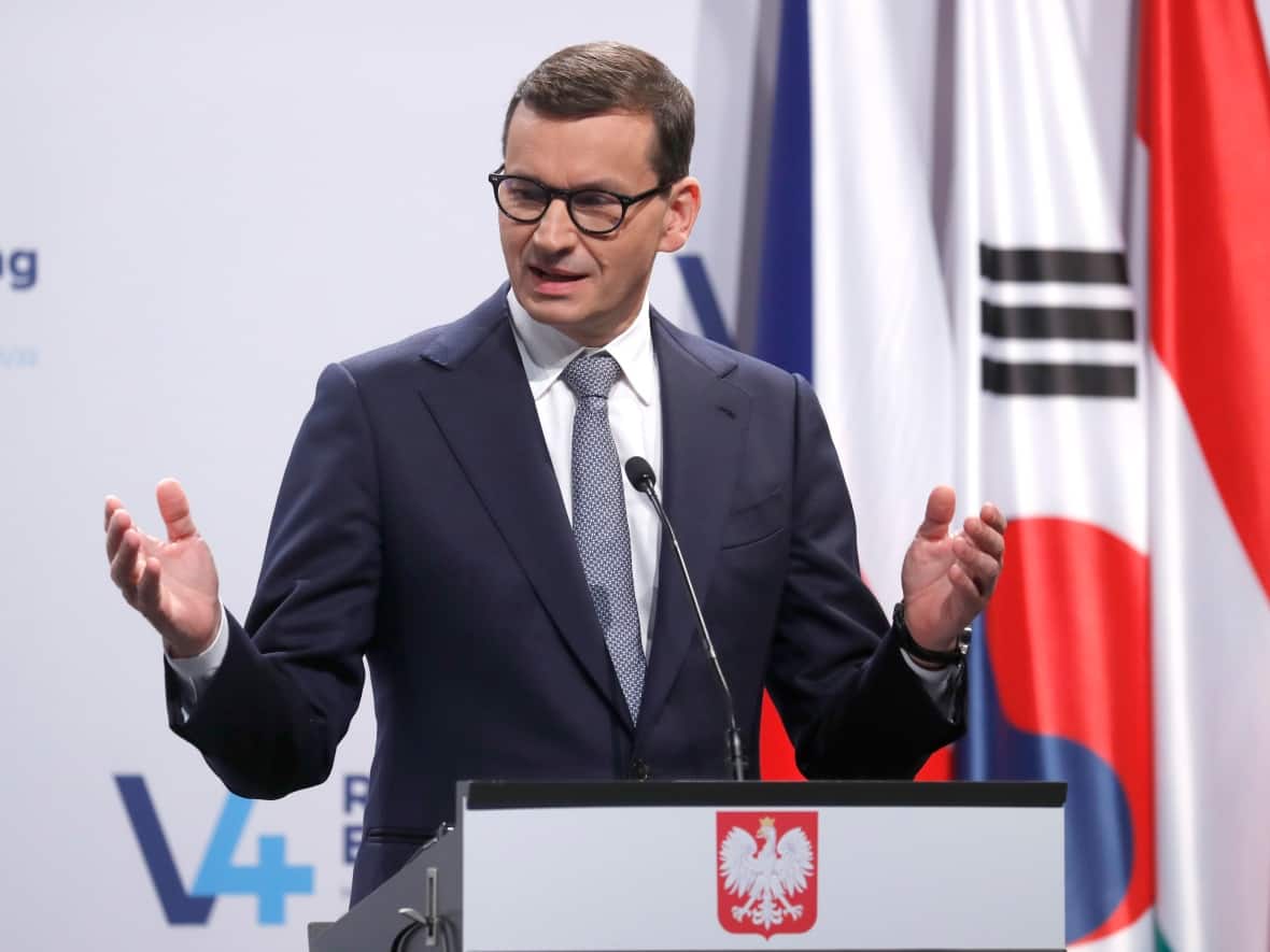 Poland's Prime Minister Mateusz Morawieck speaks after a meeting of central Europe's informal body of cooperation, the Visegrad Group, in Budapest, Hungary on Nov. 4, 2021. (Laszlo Balogh/Associated Press - image credit)