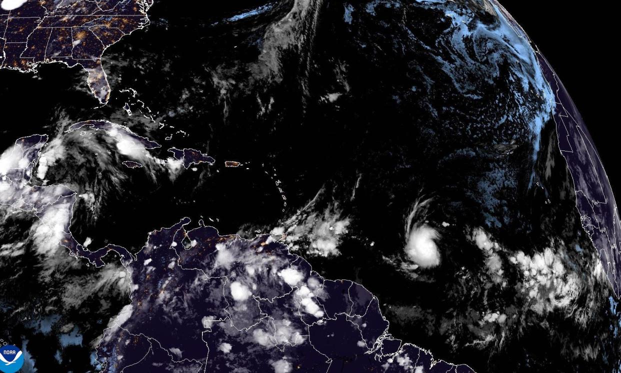 <span>Tropical Storm Beryl, lower center-right, strengthens over the Atlantic Ocean on 29 June 2024.</span><span>Photograph: AP</span>