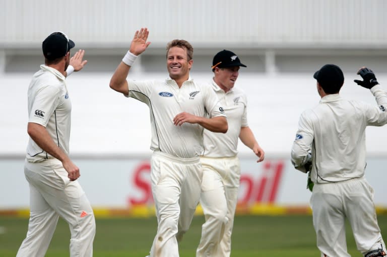 New Zealand bowler Neil Wagner (2L) celebrates the dismissal of South Africa batsman JP Duminy (not pictured) during the first Test at the Sahara Cricket stadium in Durban on August 19, 2016