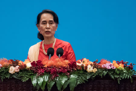 Myanmar's State Counsellor Aung San Suu Kyi gives a speech at the opening ceremony of the "CPC in dialogue with world political parties high-level meeting, at the Great Hall of the People in Beijing, China December 1, 2017. REUTERS/Fred Dufour/Pool/Files