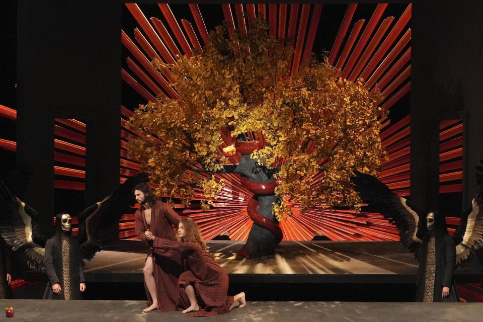 Cast members perform during the rehearsal of the 42nd Passion Play in Oberammergau, Germany, Wednesday, May 4, 2022. After a two-year delay due to the coronavirus, Germany's famous Oberammergau Passion Play is opening soon. The play dates back to 1634, when Catholic residents of a small Bavarian village vowed to perform a play of the last days of Jesus Christ every 10 years, if only God would spare them of any further Black Death victims. The town did suffer some COVID-19 deaths, but the show goes on. Almost half of the village's residents— more than 1,800 people including 400 children — will participate. (AP Photo/Matthias Schrader)