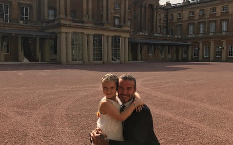 David Beckham, 42, with daughter Harper outside Buckingham Palace where she celebrated her sixth birthday - Credit:  Instagram