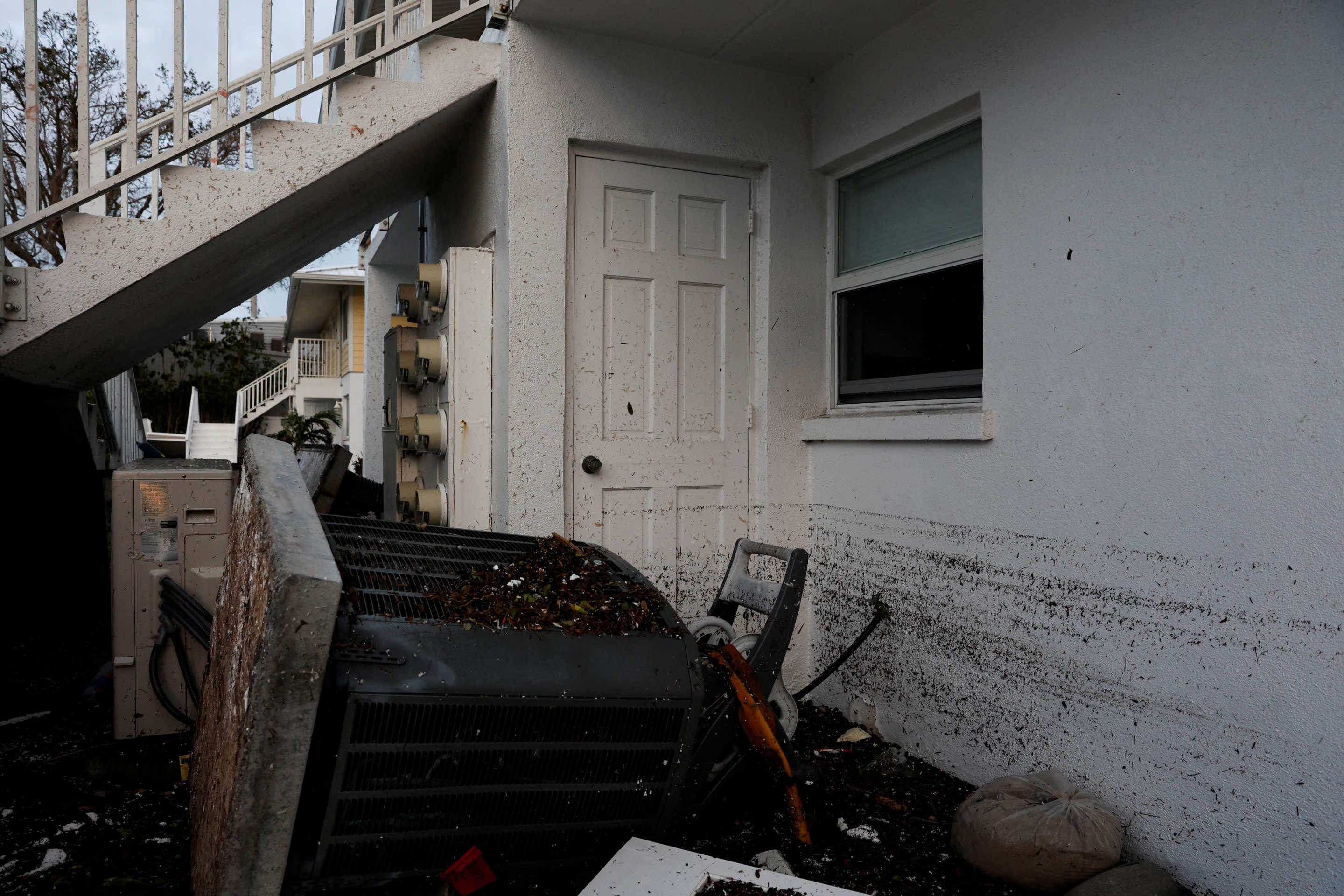 Damaged items lie outside a building after Hurricane Milton made landfall in Venice, Florida, on October 10, 2024. (Marco Bello/Reuters)