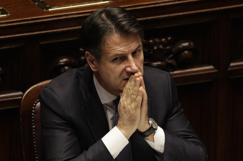 Italian Premier Giuseppe Conte sits as he attends the parliament debate ahead of confidence vote later at the Lower Chamber in Rome, Monday, Sept. 9, 2019. Conte is pitching for support in Parliament for his new left-leaning coalition ahead of crucial confidence votes. (AP Photo/Gregorio Borgia)