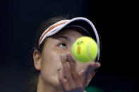 Peng Shuai of China prepares to serve against Shelby Rogers of the United States during the women's singles match of the China Open tennis tournament at the Diamond Court in Beijing, on Oct. 2, 2017. China's Foreign Ministry is sticking to its line that it isn't aware of the controversy surrounding tennis professional Peng Shuai, who disappeared after accusing a former top official of sexually assaulting her. A ministry spokesperson said Friday that the matter was not a diplomatic question and that he was not aware of the situation. (AP Photo/Andy Wong, File)