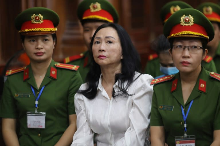 Vietnamese property tycoon Truong My Lan (C) looks on at a court in Ho Chi Minh City on Thursday (STR)