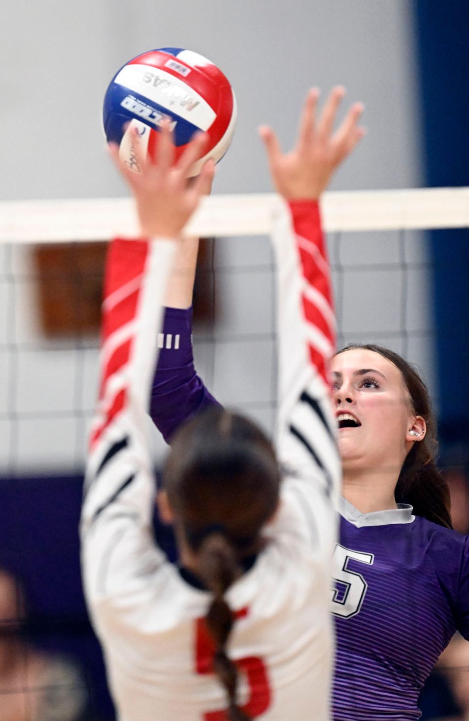 Michaela Muldoon of Bourne pushes the ball over Kamryn Rodrigues of Old Rochester.